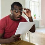 man looks surprised at investment growth